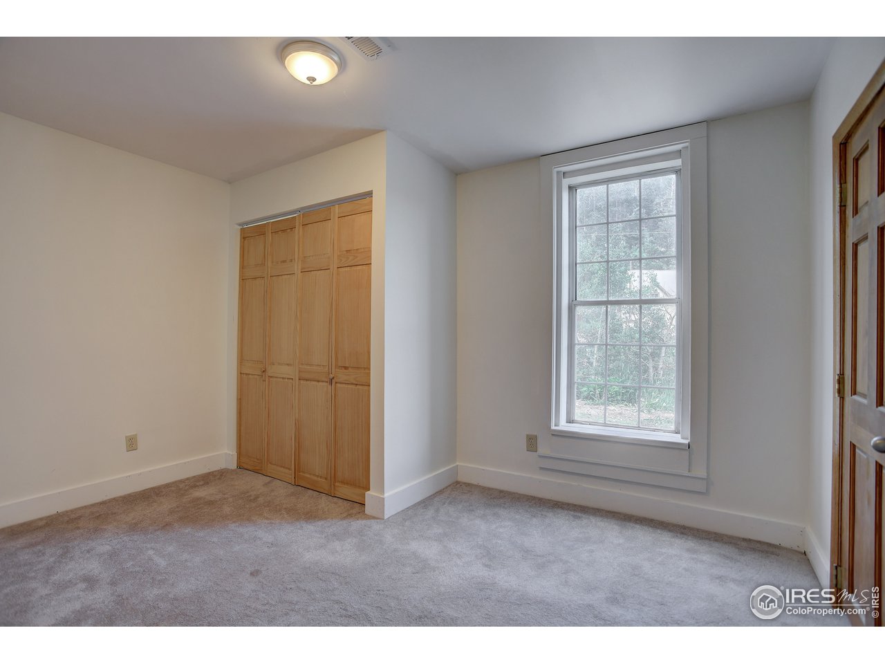 35 Boston Street Ward, CO 80481 - Photo 12 of 34 a view of an empty room with a window