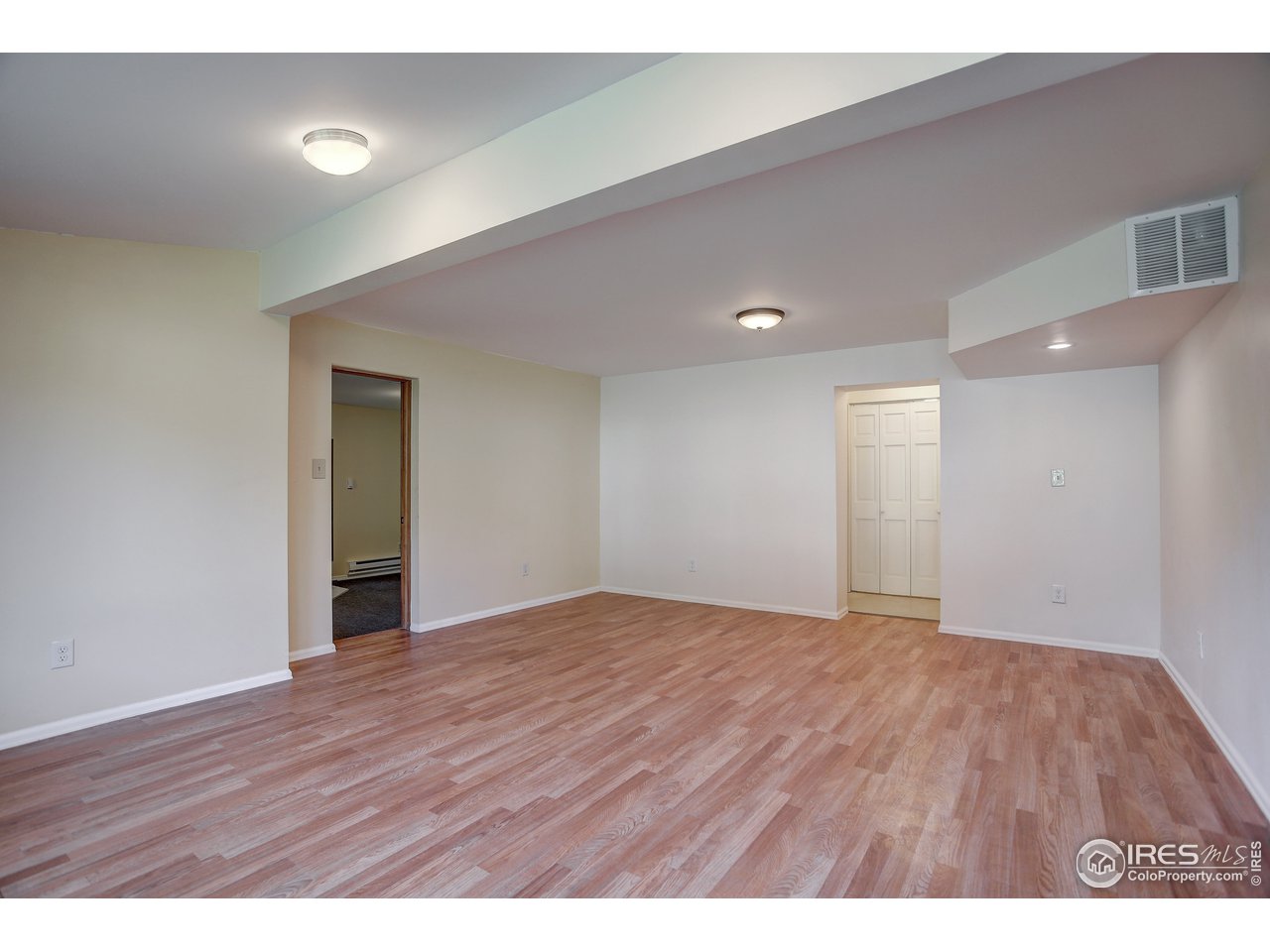 35 Boston Street Ward, CO 80481 - Photo 25 of 34 a view of an empty room with wooden floor