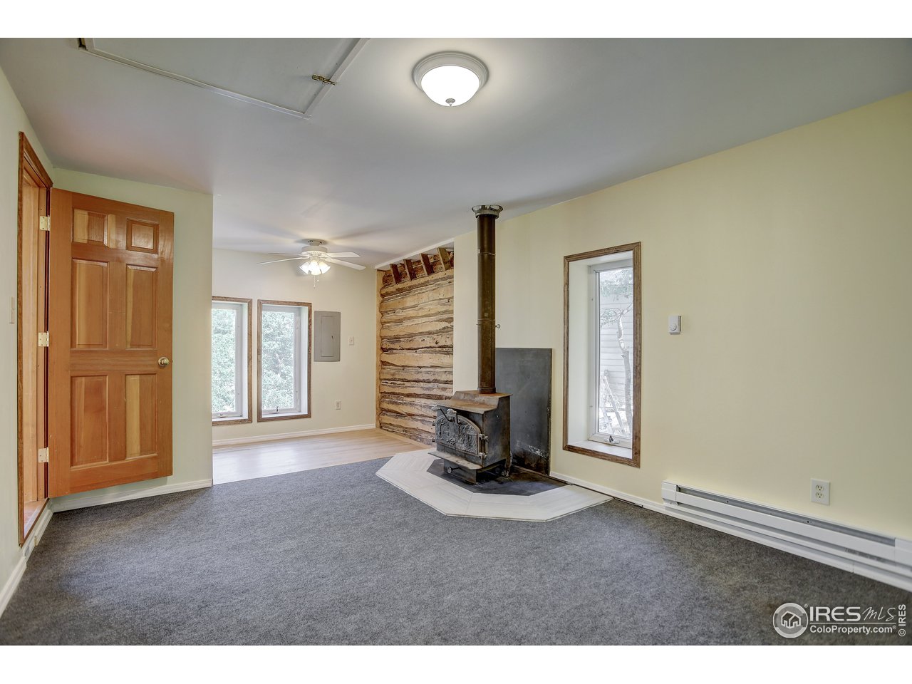 35 Boston Street Ward, CO 80481 - Photo 29 of 34 a view of an empty room and fire place