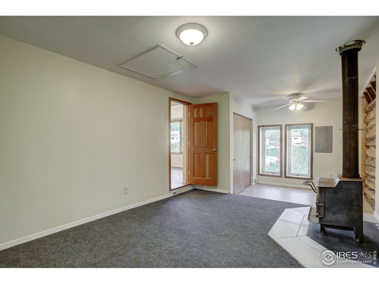 35 Boston Street Ward, CO 80481 - Photo 32 of 34 a living room with furniture and a large window