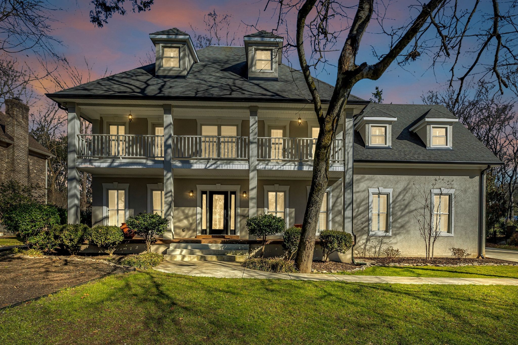 1810 Waterford Road Murfreesboro, TN 37129 - Photo 2 of 43 a front view of a house with a yard table and chairs