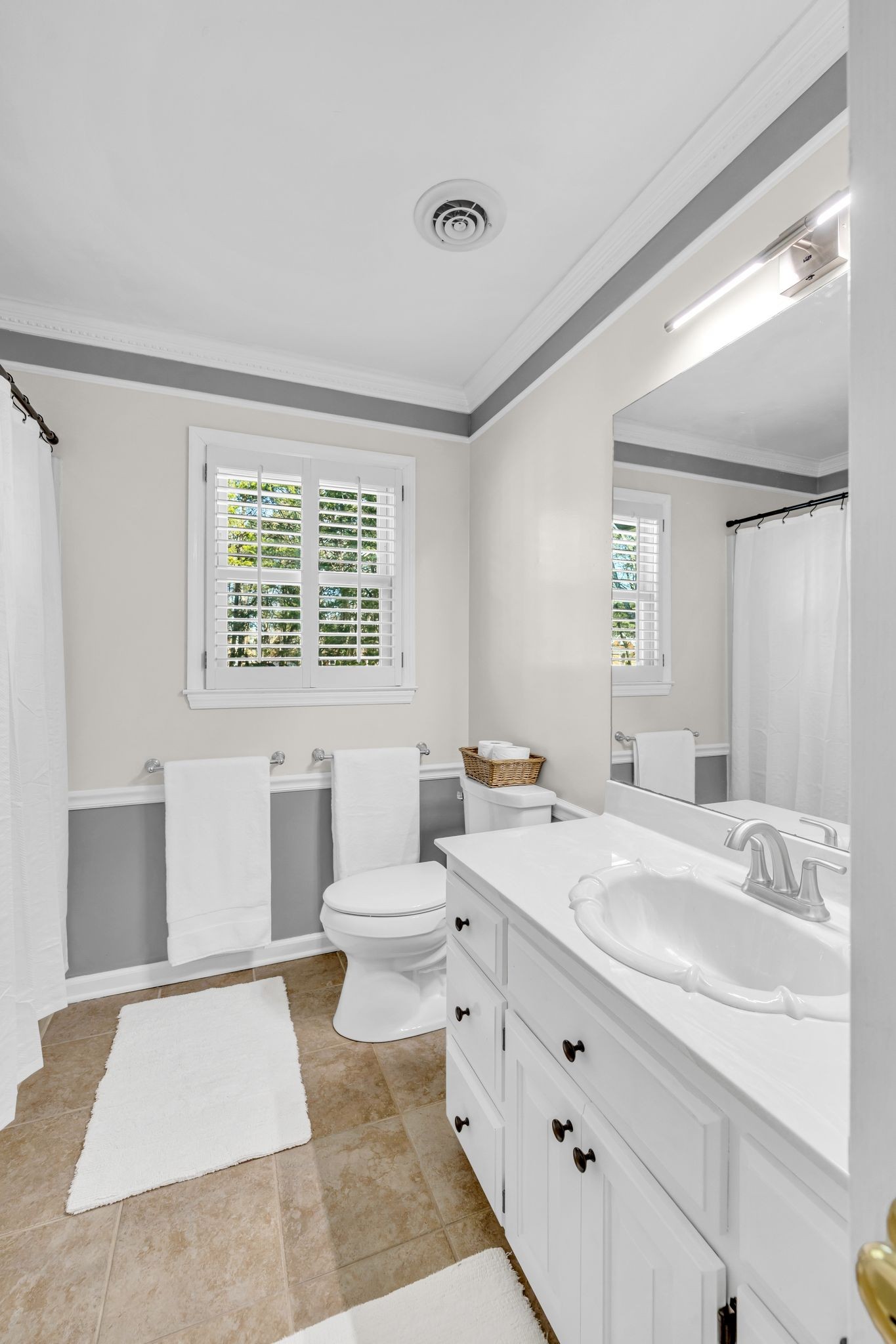 1810 Waterford Road Murfreesboro, TN 37129 - Photo 27 of 43 a spacious bathroom with double vanity a window a bathtub and a mirror