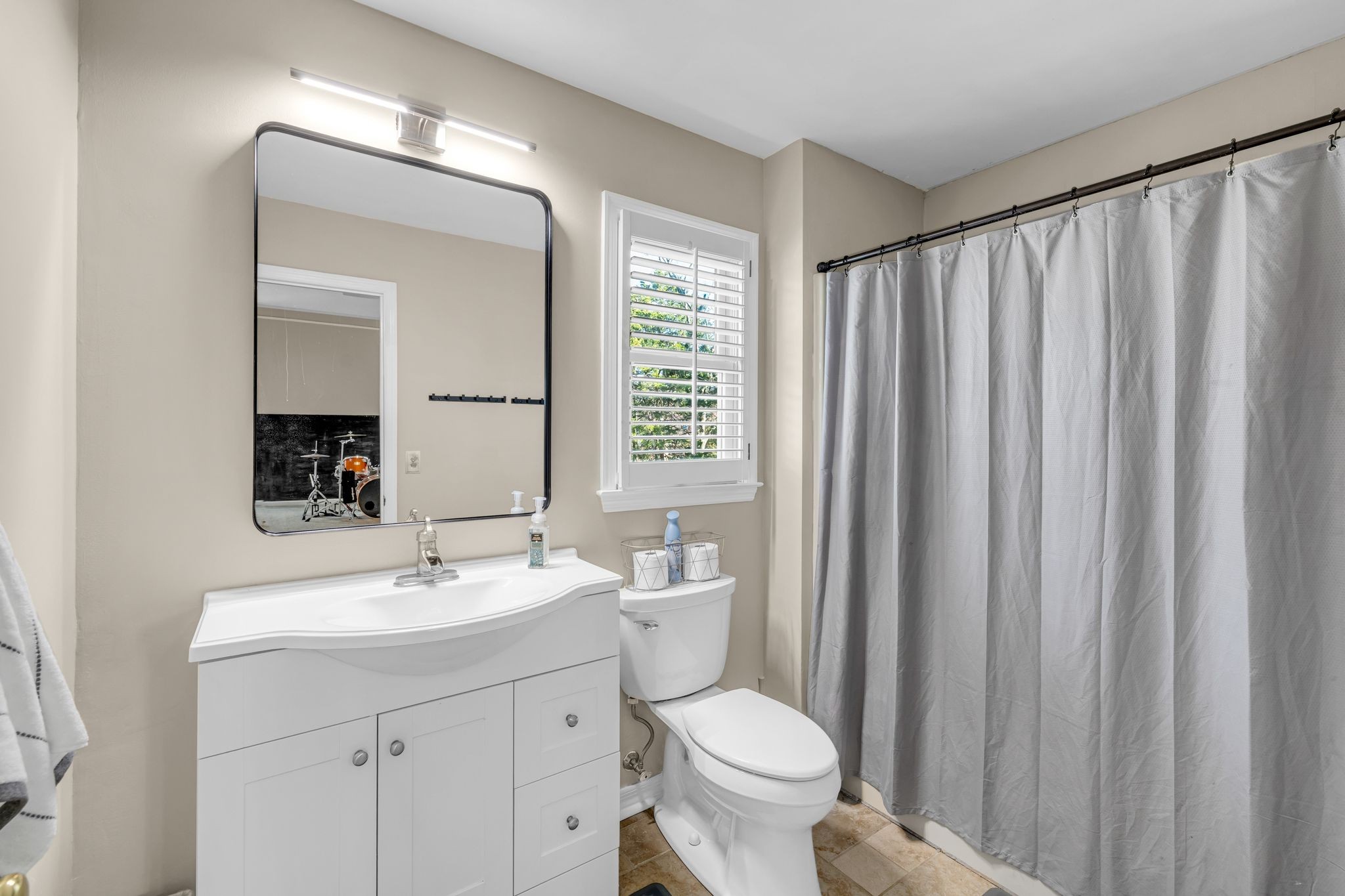 1810 Waterford Road Murfreesboro, TN 37129 - Photo 33 of 43 a bathroom with a toilet a sink and a mirror