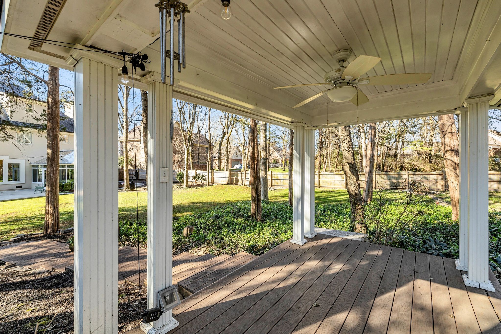 1810 Waterford Road Murfreesboro, TN 37129 - Photo 41 of 43 a view of a porch with a floor to ceiling windows with wooden floor