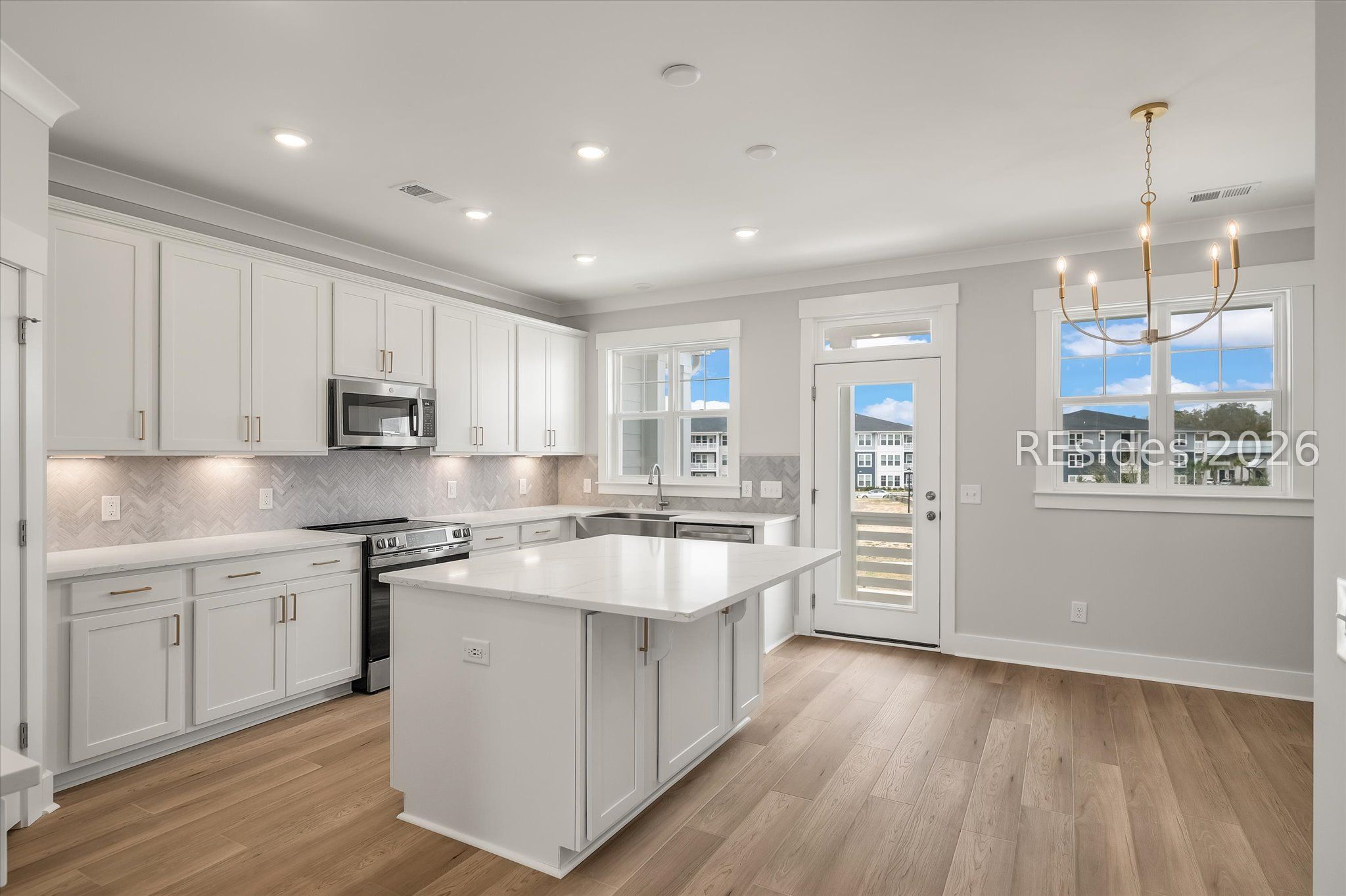 423 East Parkside Cmns Bluffton, SC 29910 - Photo 13 of 34 Bright white soft close cabinets & drawers