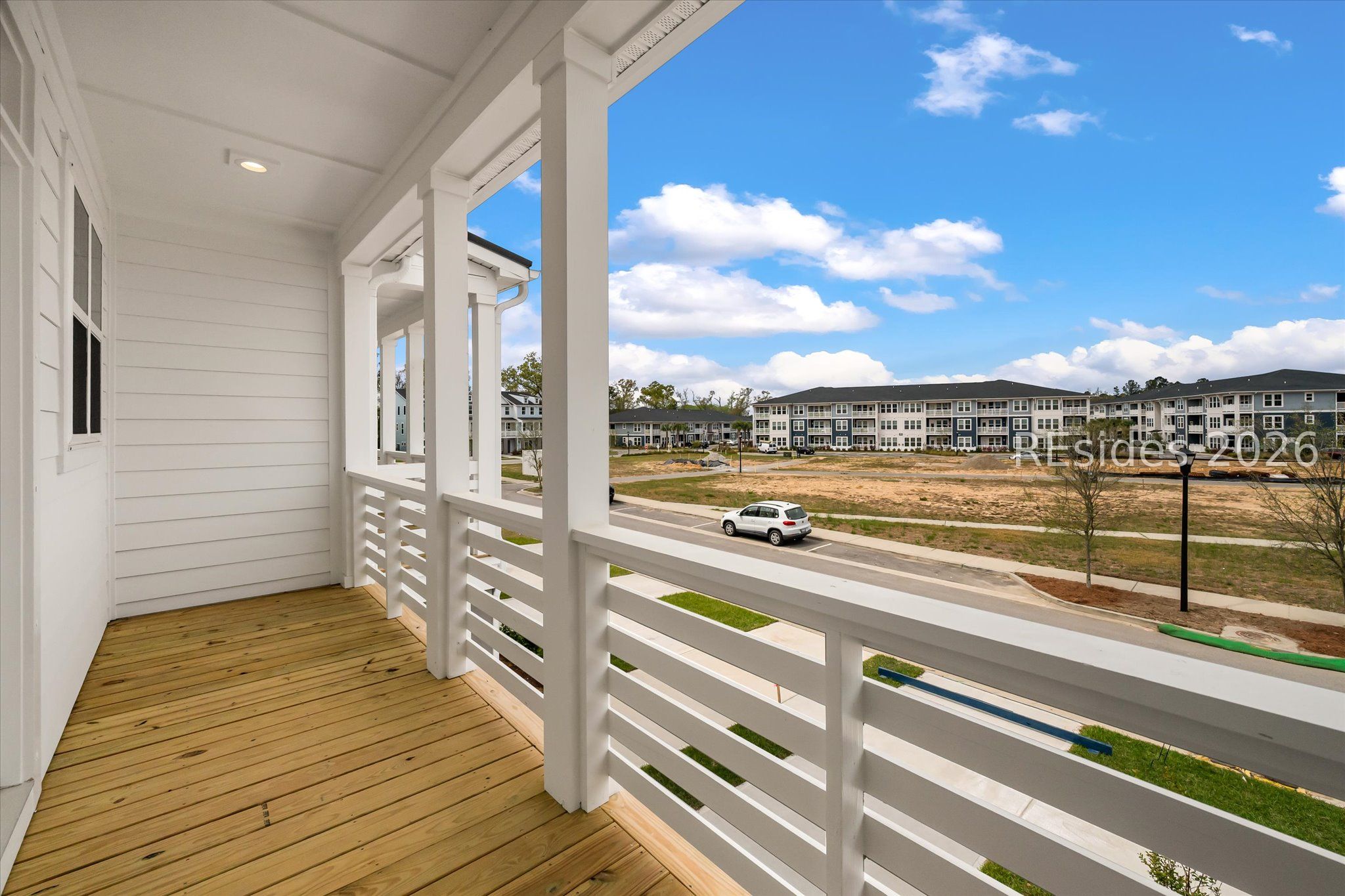 423 East Parkside Cmns Bluffton, SC 29910 - Photo 14 of 34 Enjoy beautiful breezes from your balcony!