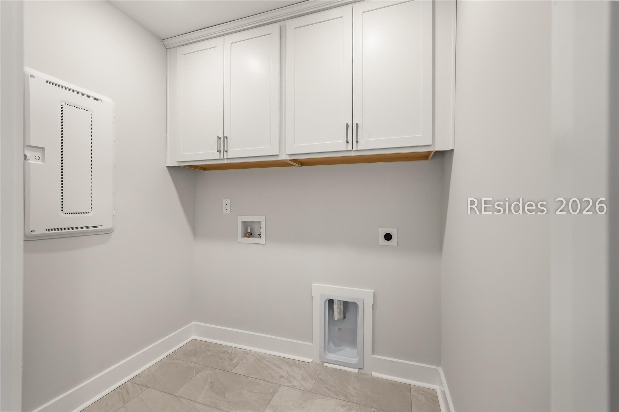 423 East Parkside Cmns Bluffton, SC 29910 - Photo 23 of 34 Walk-in laundry room w/cabinets & W/D included!