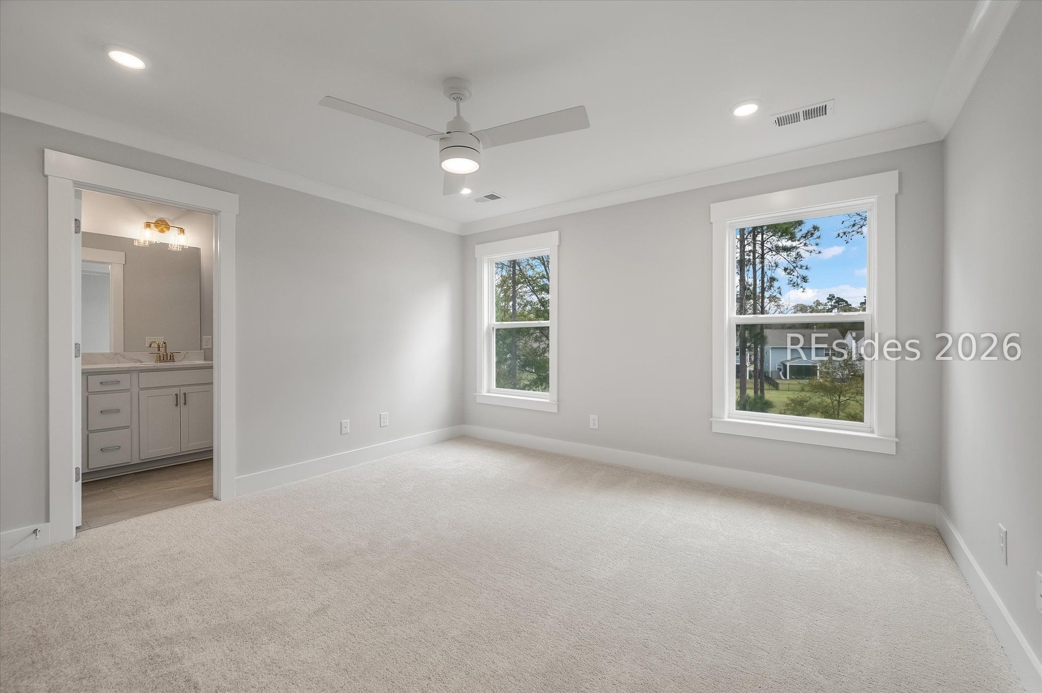 423 East Parkside Cmns Bluffton, SC 29910 - Photo 25 of 34 Primary bedroom in rear of home - more great views