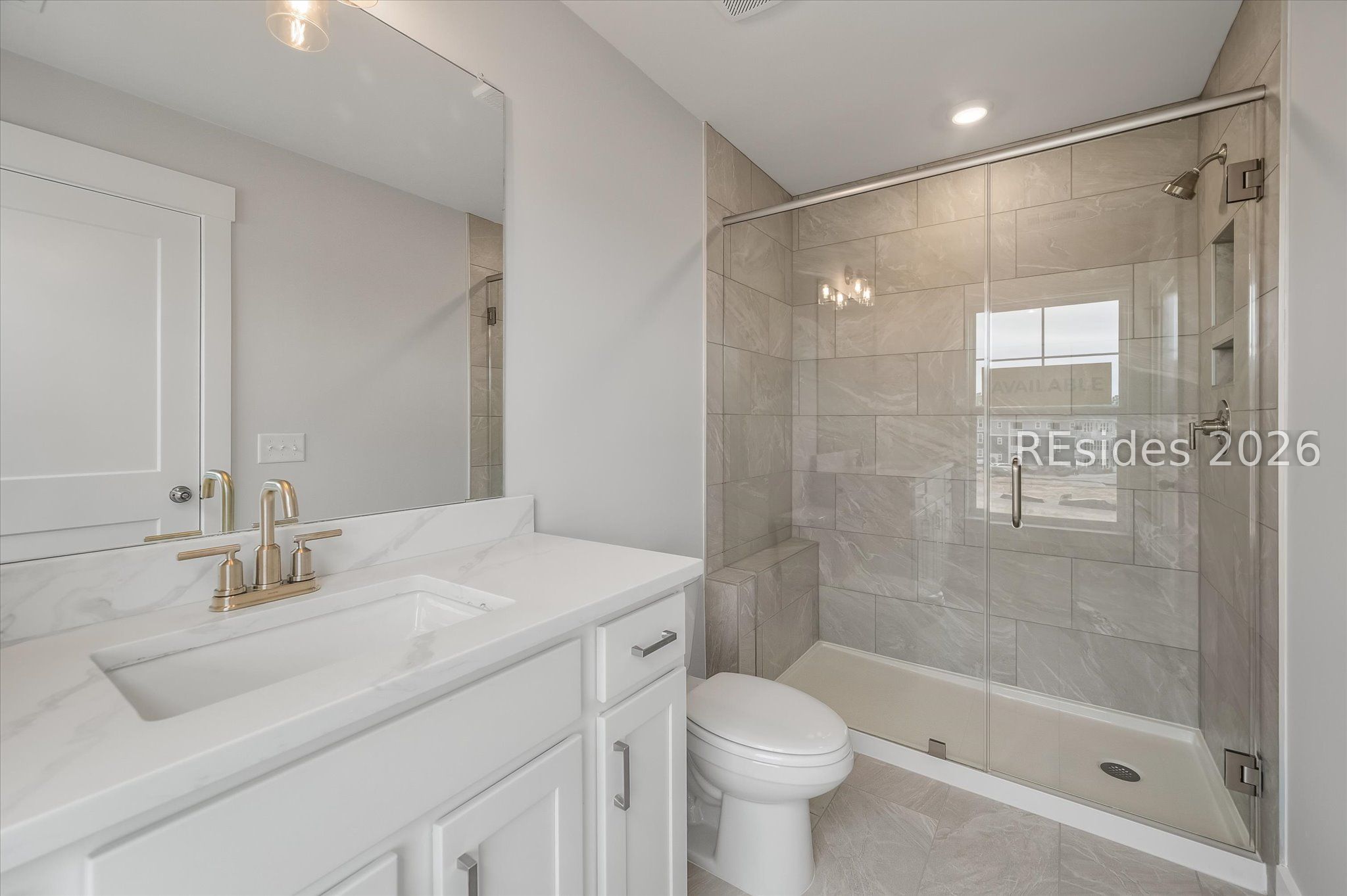 423 East Parkside Cmns Bluffton, SC 29910 - Photo 31 of 34 Quartz counter tops, walk-in shower and niches!