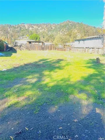 a view of an ocean and a mountain
