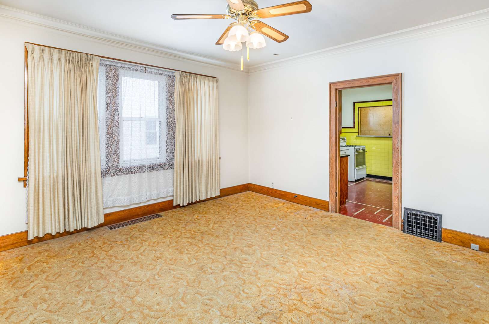 2723 Indiana Avenue Lansing, IL 60438 - Photo 5 of 18 a view of an empty room with a window