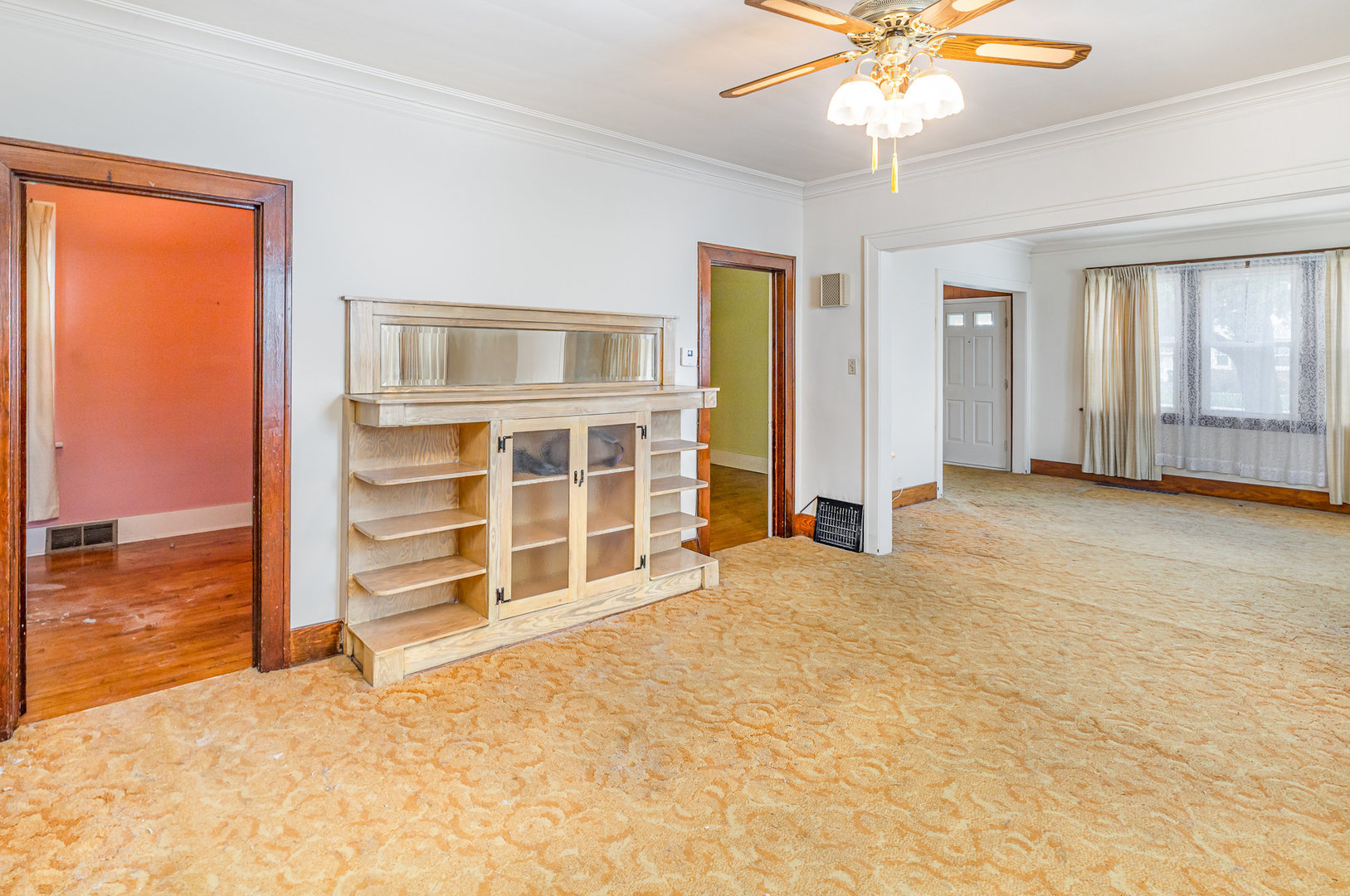 2723 Indiana Avenue Lansing, IL 60438 - Photo 7 of 18 a view of an empty room with a window