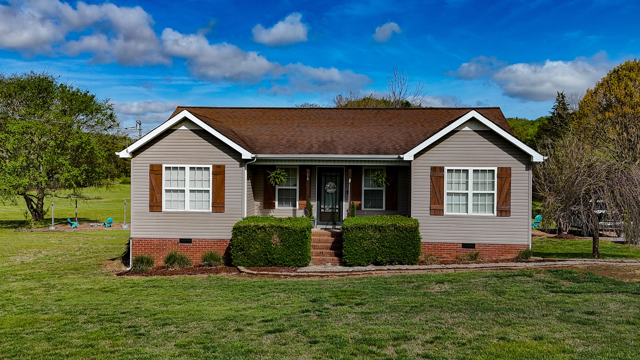 16 Volunteer Road Petersburg, TN 37144 - Photo 1 of 41 a front view of a house with a yard