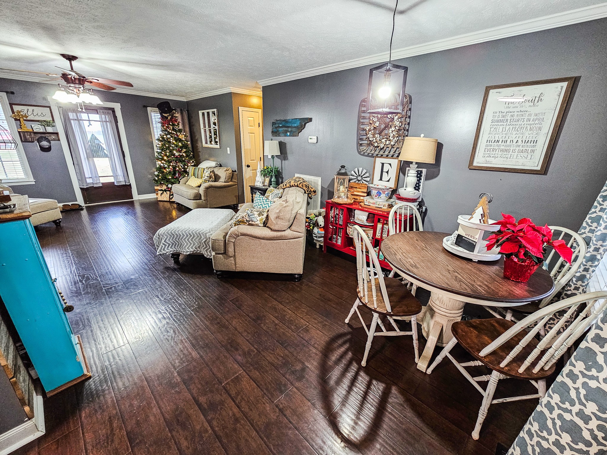 16 Volunteer Road Petersburg, TN 37144 - Photo 11 of 28 a view of a dining room with furniture wooden floor and a chandelier