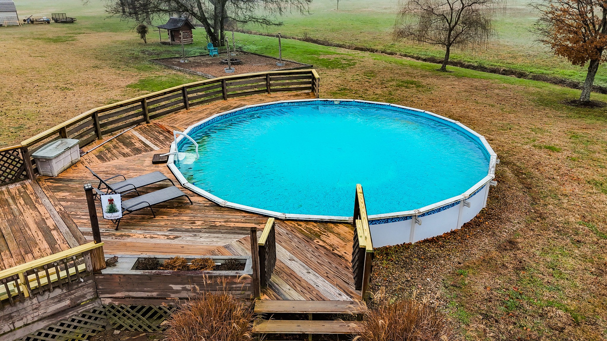 16 Volunteer Road Petersburg, TN 37144 - Photo 20 of 28 a view of a swimming pool with a lounge chairs