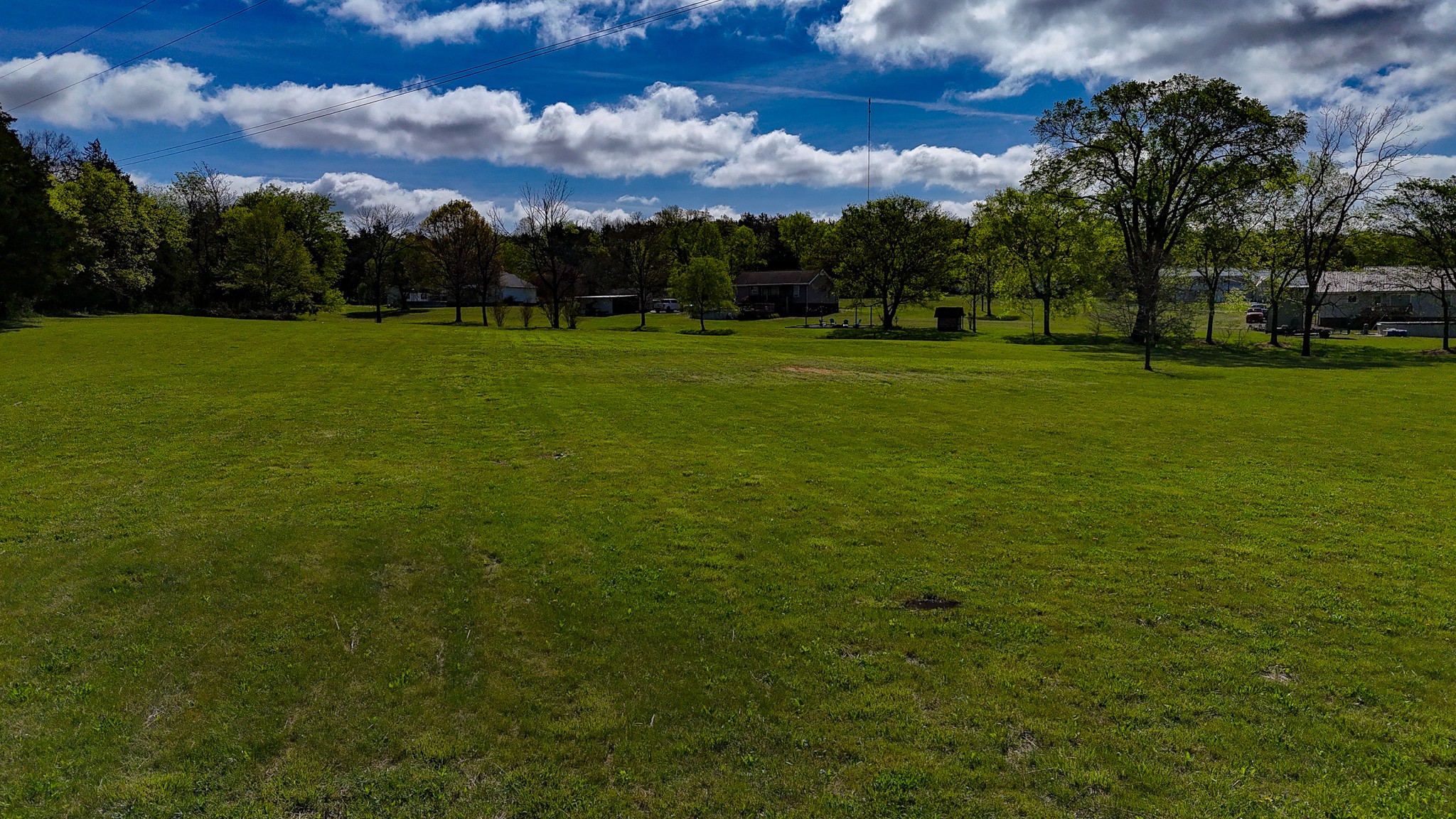 16 Volunteer Road Petersburg, TN 37144 - Photo 25 of 41 a view of grassy field with benches