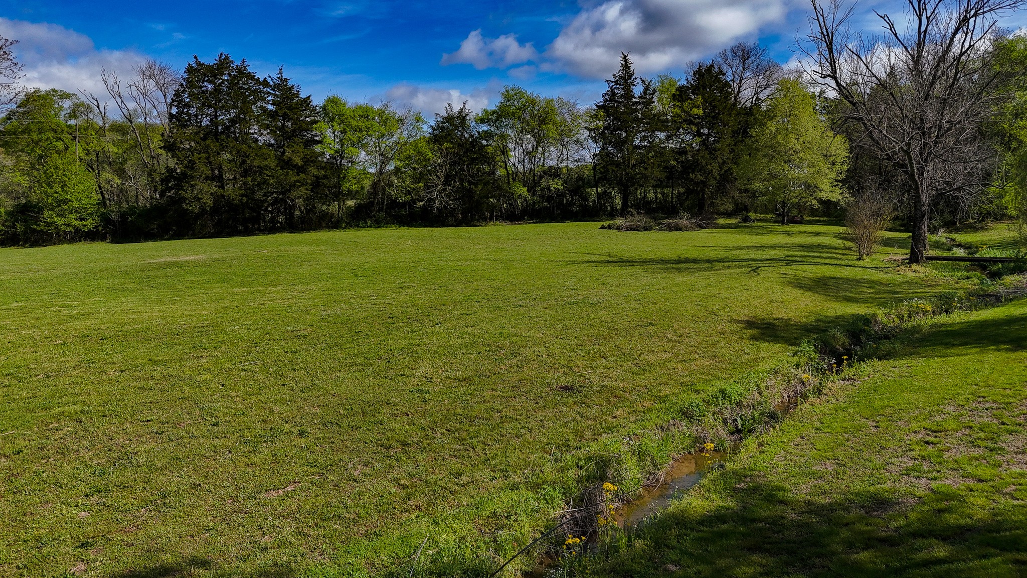 16 Volunteer Road Petersburg, TN 37144 - Photo 26 of 41 a view of a golf course with a lake