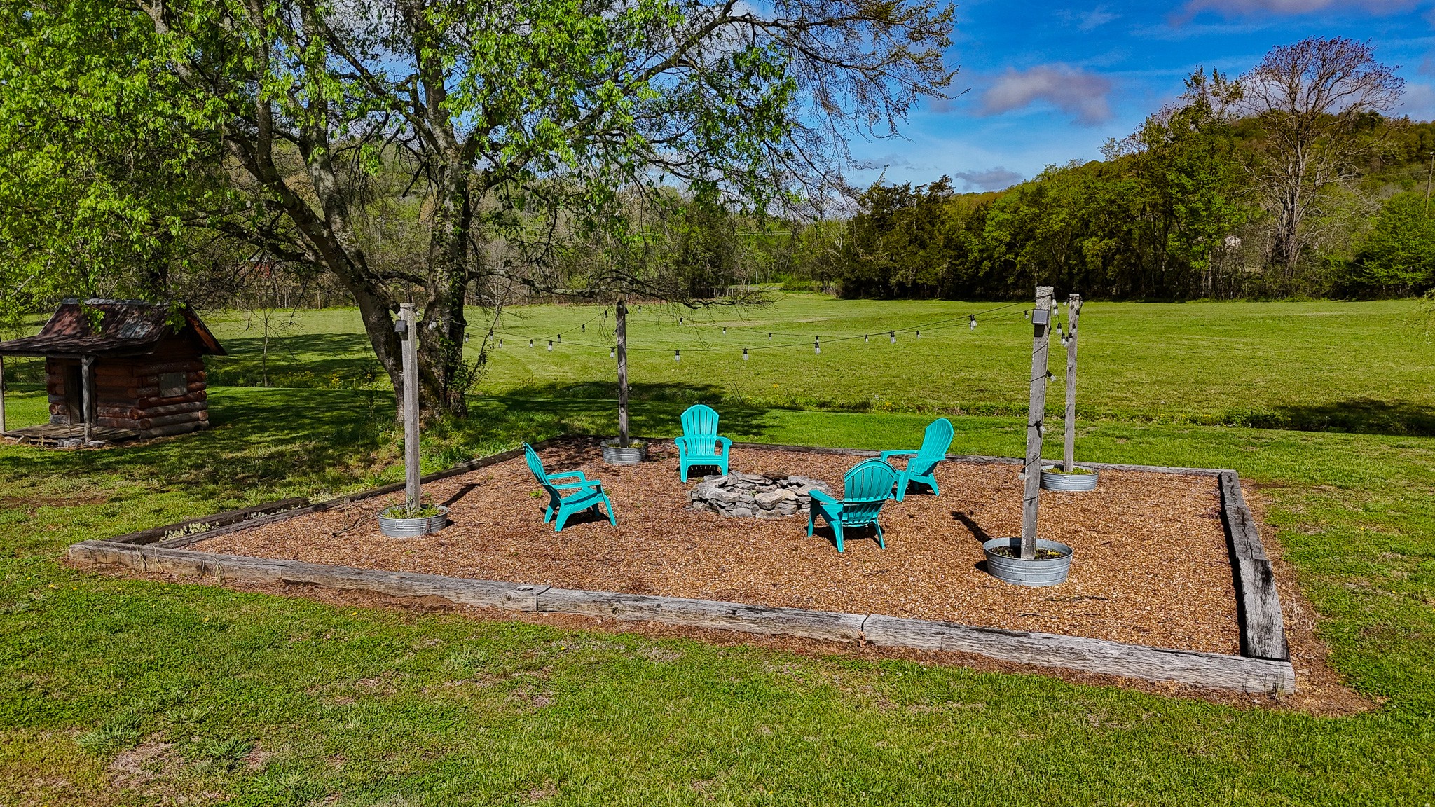 16 Volunteer Road Petersburg, TN 37144 - Photo 27 of 41 a view of a park with lawn chairs and a big yard