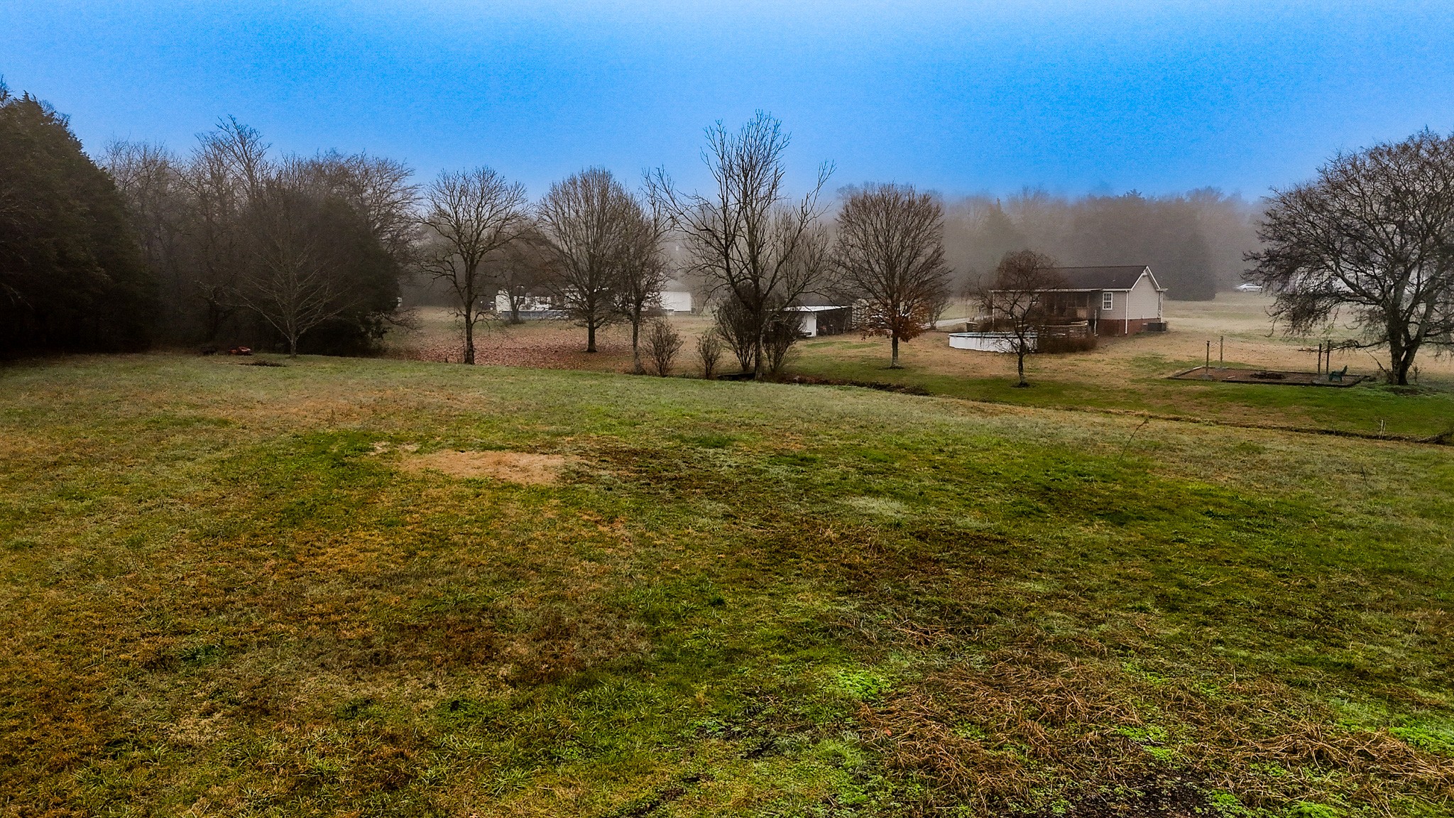 16 Volunteer Road Petersburg, TN 37144 - Photo 27 of 28 a view of a field with trees in the background