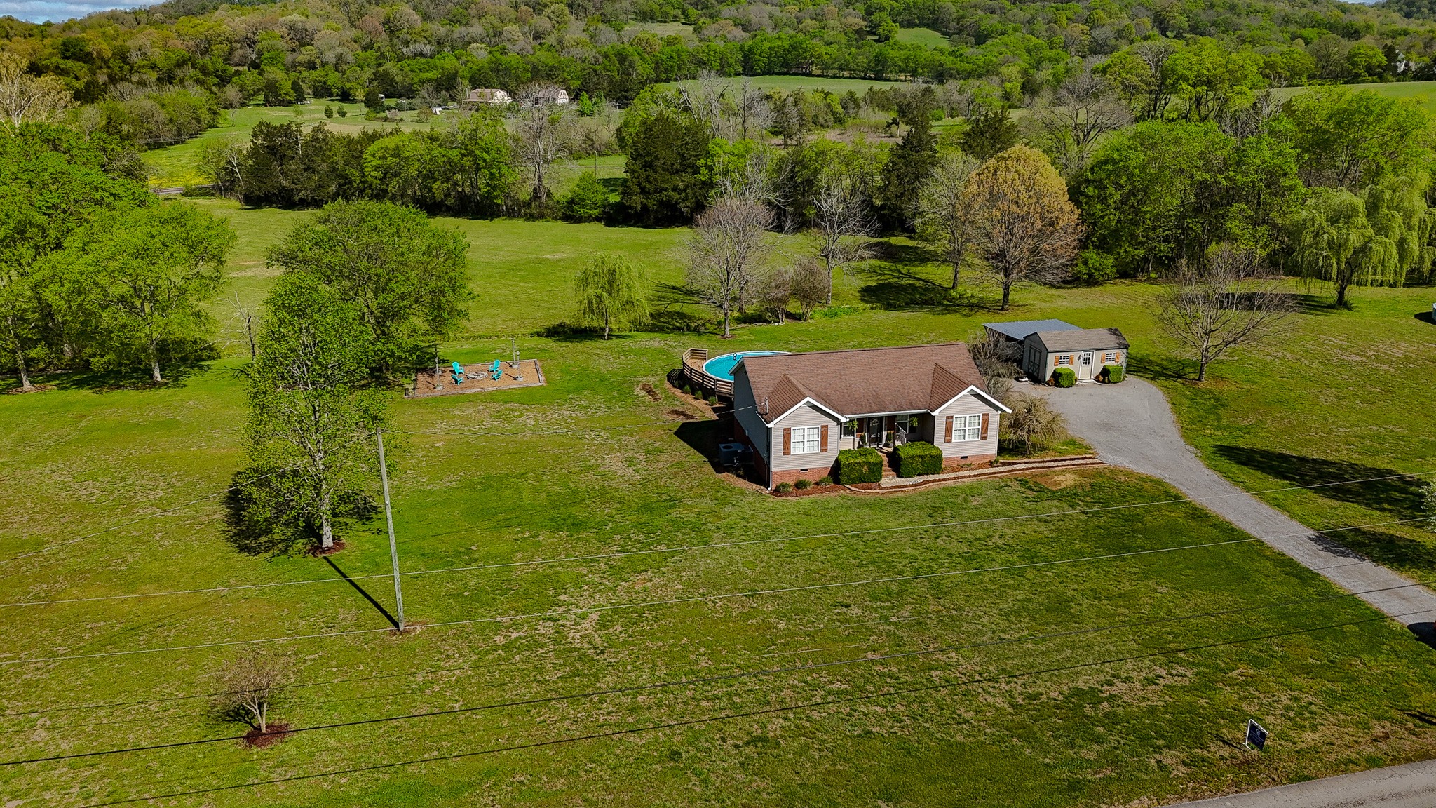 16 Volunteer Road Petersburg, TN 37144 - Photo 34 of 41 an aerial view of a house with a yard