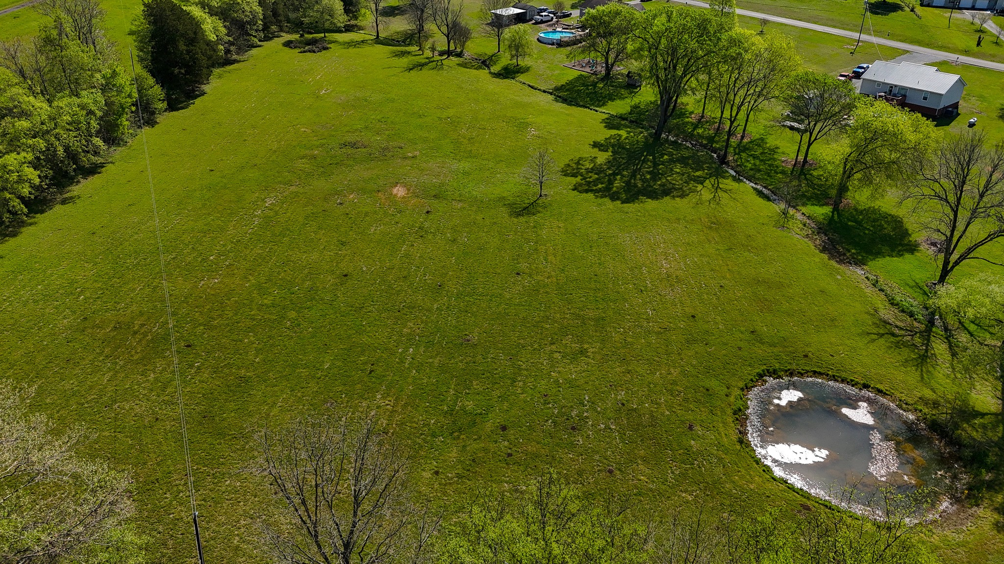 16 Volunteer Road Petersburg, TN 37144 - Photo 37 of 41 a view of a garden with a lake