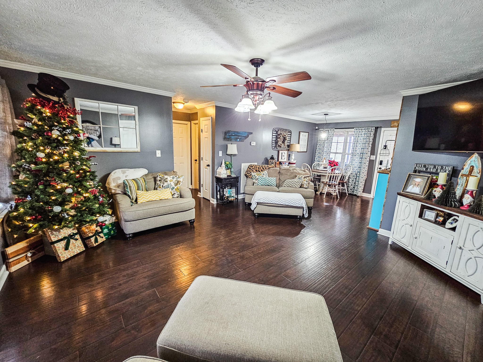 16 Volunteer Road Petersburg, TN 37144 - Photo 9 of 41 a living room with furniture and a flat screen tv