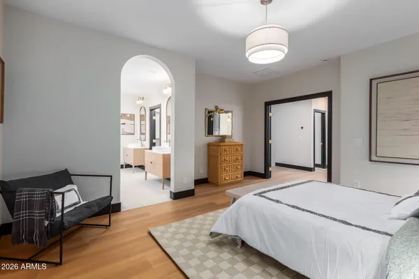 an empty room with a ceiling fan and window