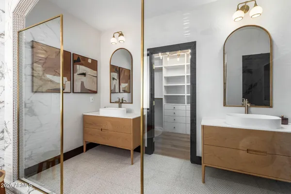 a view of an empty room with a kitchen