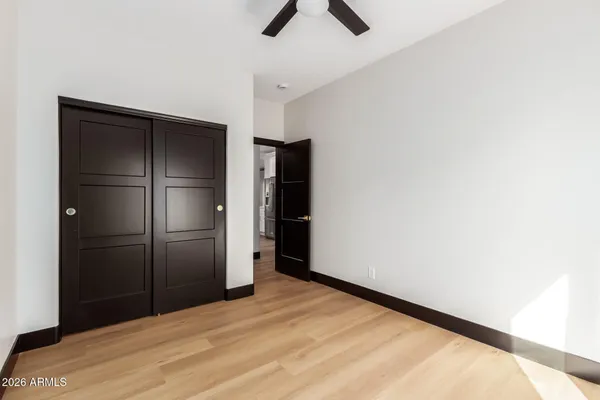 a spacious bathroom with a double vanity sink and a mirror