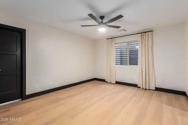 a view of a house with backyard porch and garden