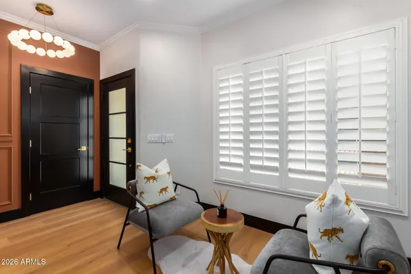 a living room with furniture and a window