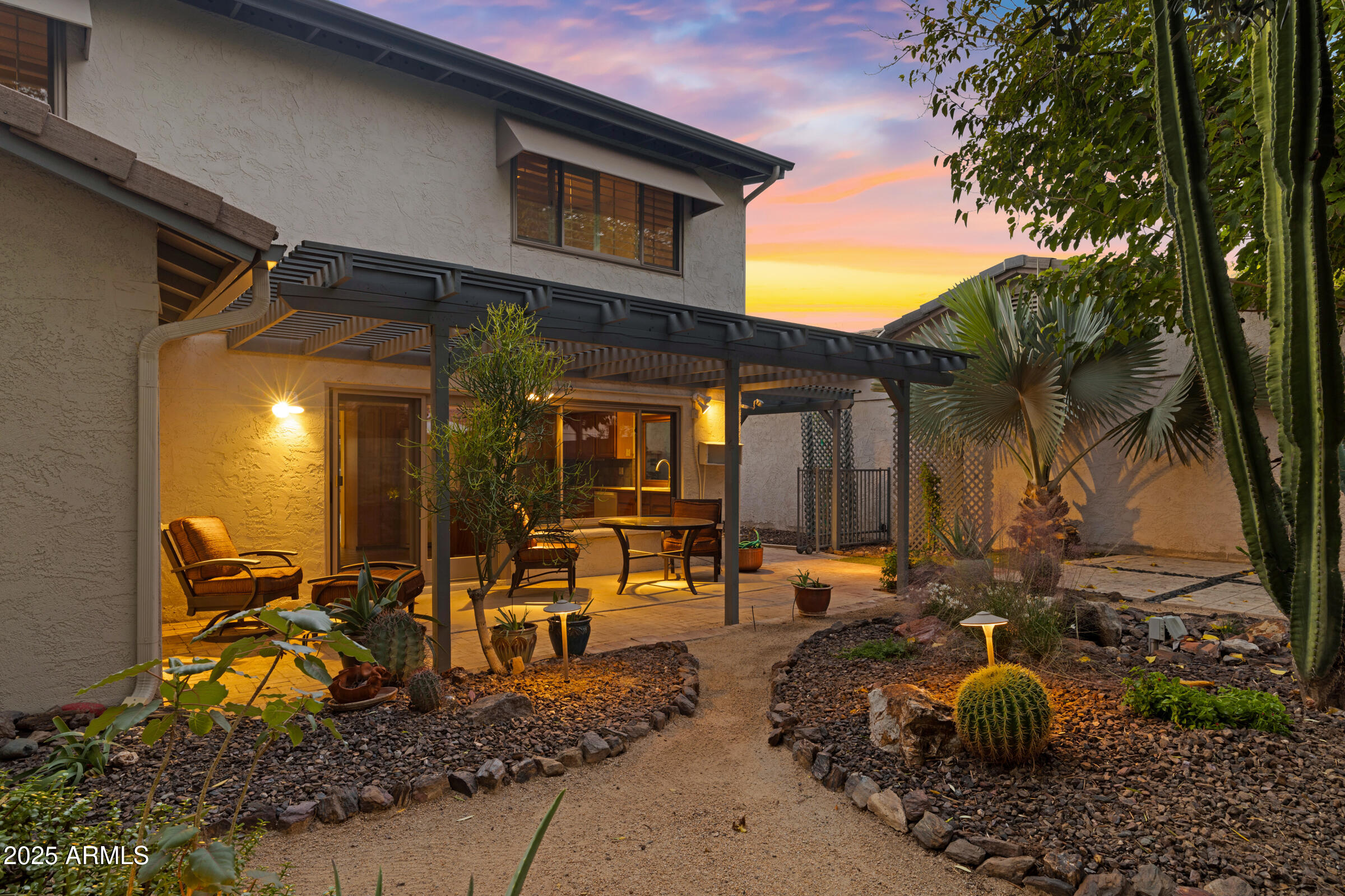 5627 South Crows Nest Road Tempe, AZ 85283 - Photo 52 of 93 a backyard of a house with yard barbeque oven and outdoor seating
