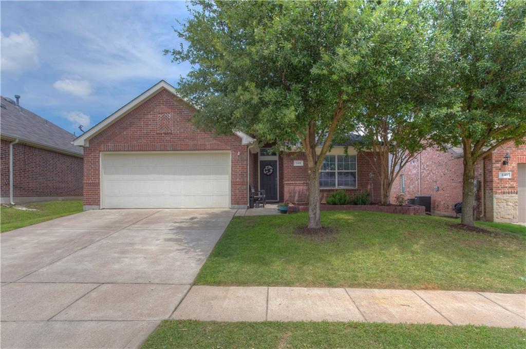 545 Anchor Way Crowley, TX 76036 - Photo 1 of 1 a front view of a house with a garden and trees