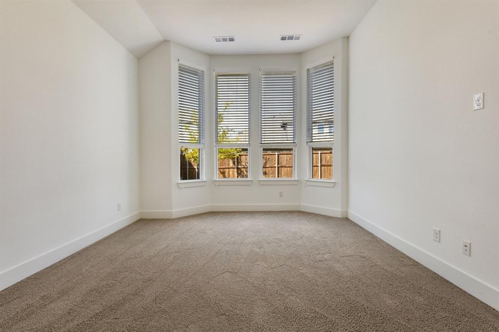 1704 Hydrangea Lane Prosper, TX 75078 - Photo 19 of 25 Empty room featuring light colored carpet and baseboards