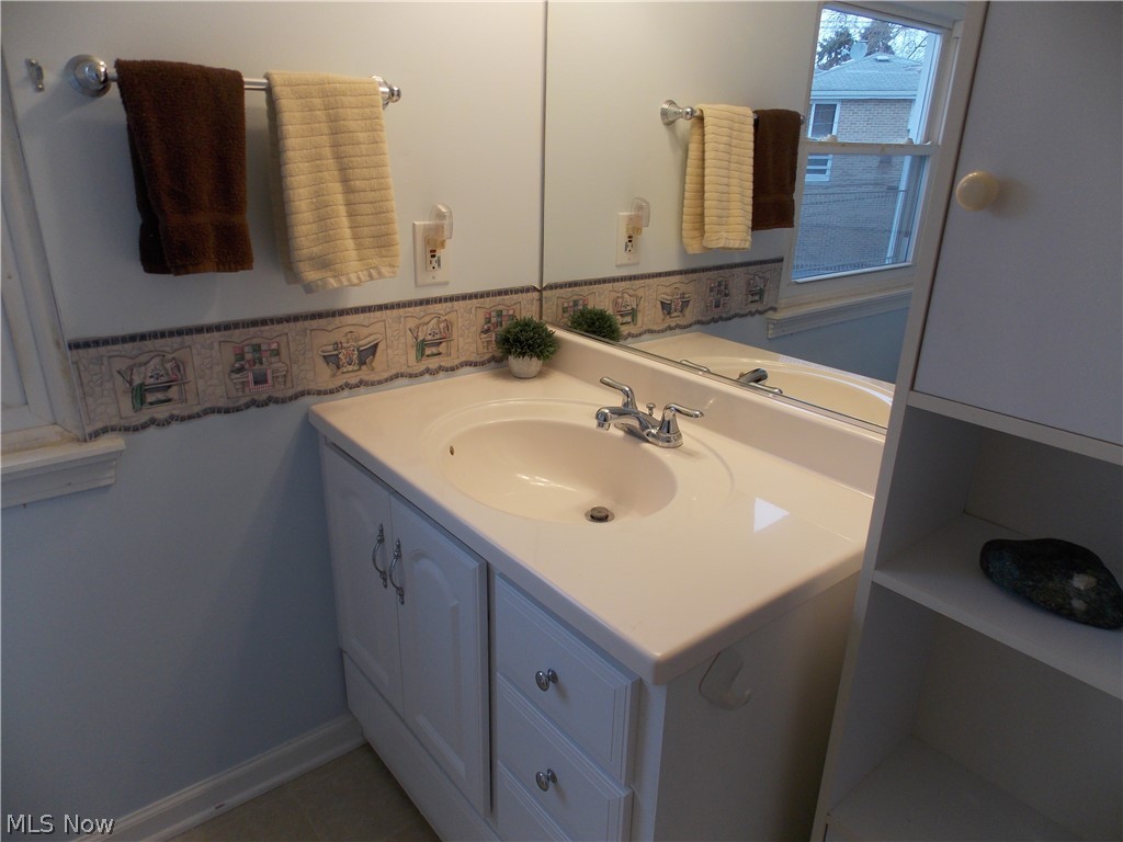 6299 South Canterbury Road Parma, OH 44129 - Photo 18 of 26 Master bathroom with walk in shower.