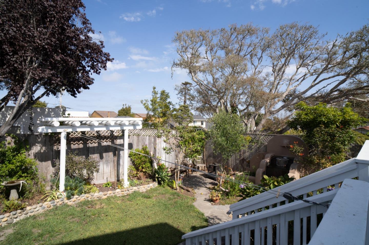 928 Hellam Street Monterey, CA 93940 - Photo 13 of 25 a view of a house with a yard