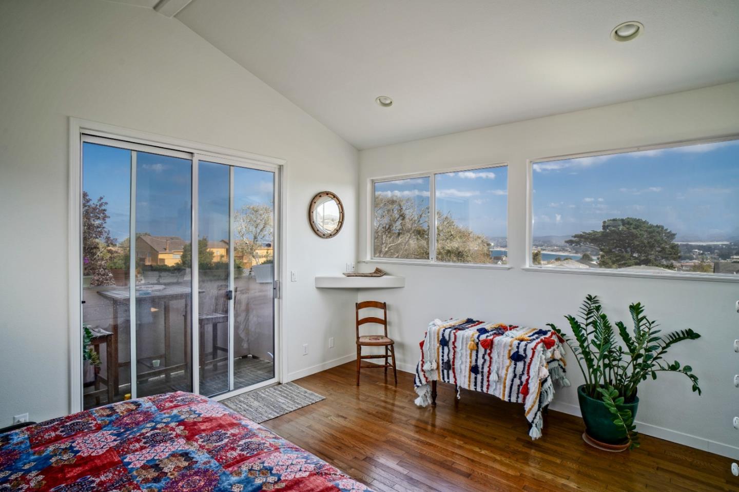 928 Hellam Street Monterey, CA 93940 - Photo 19 of 25 a bedroom with furniture and potted plant