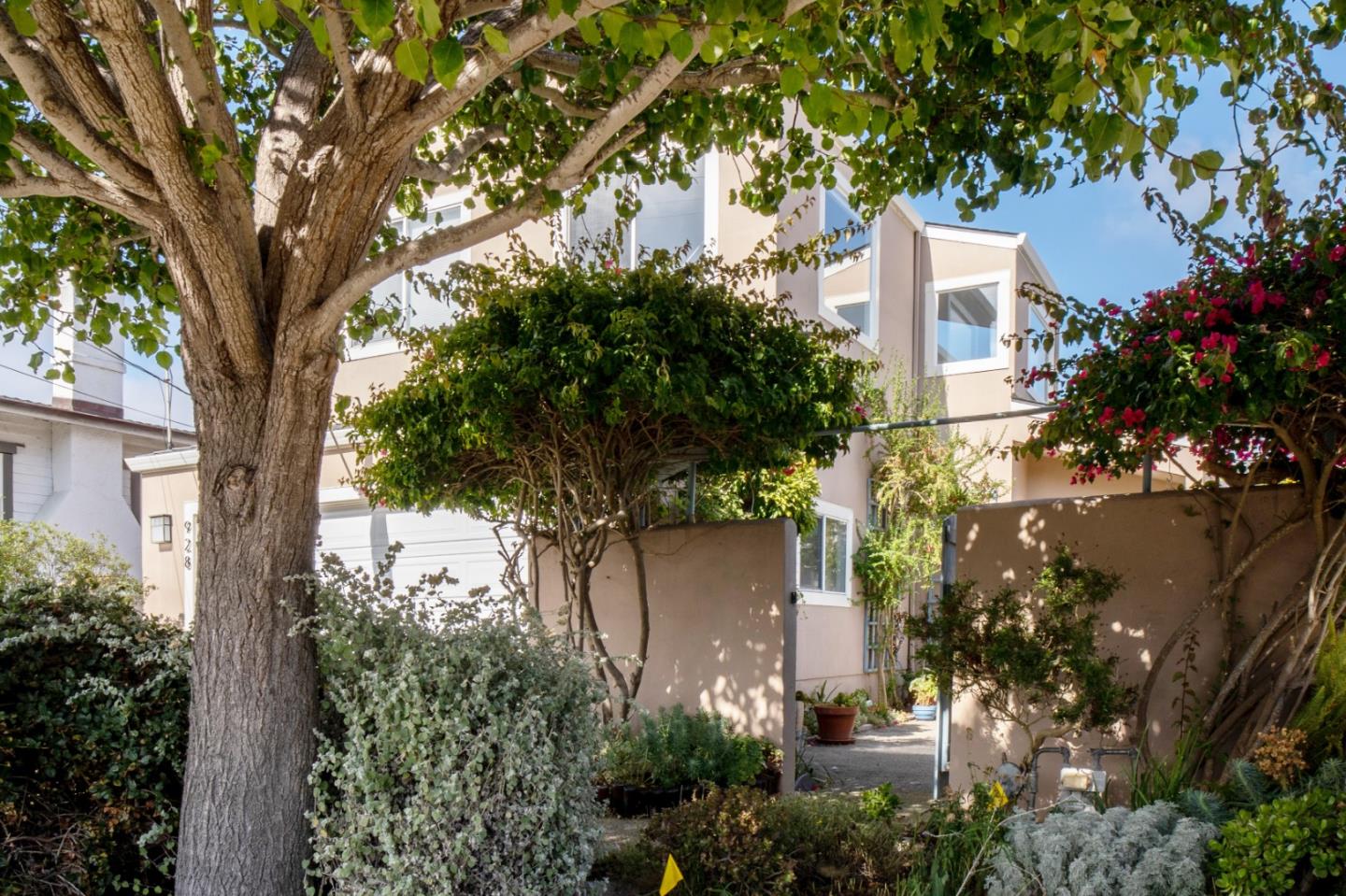 928 Hellam Street Monterey, CA 93940 - Photo 23 of 25 aerial view of a house with a yard and large trees