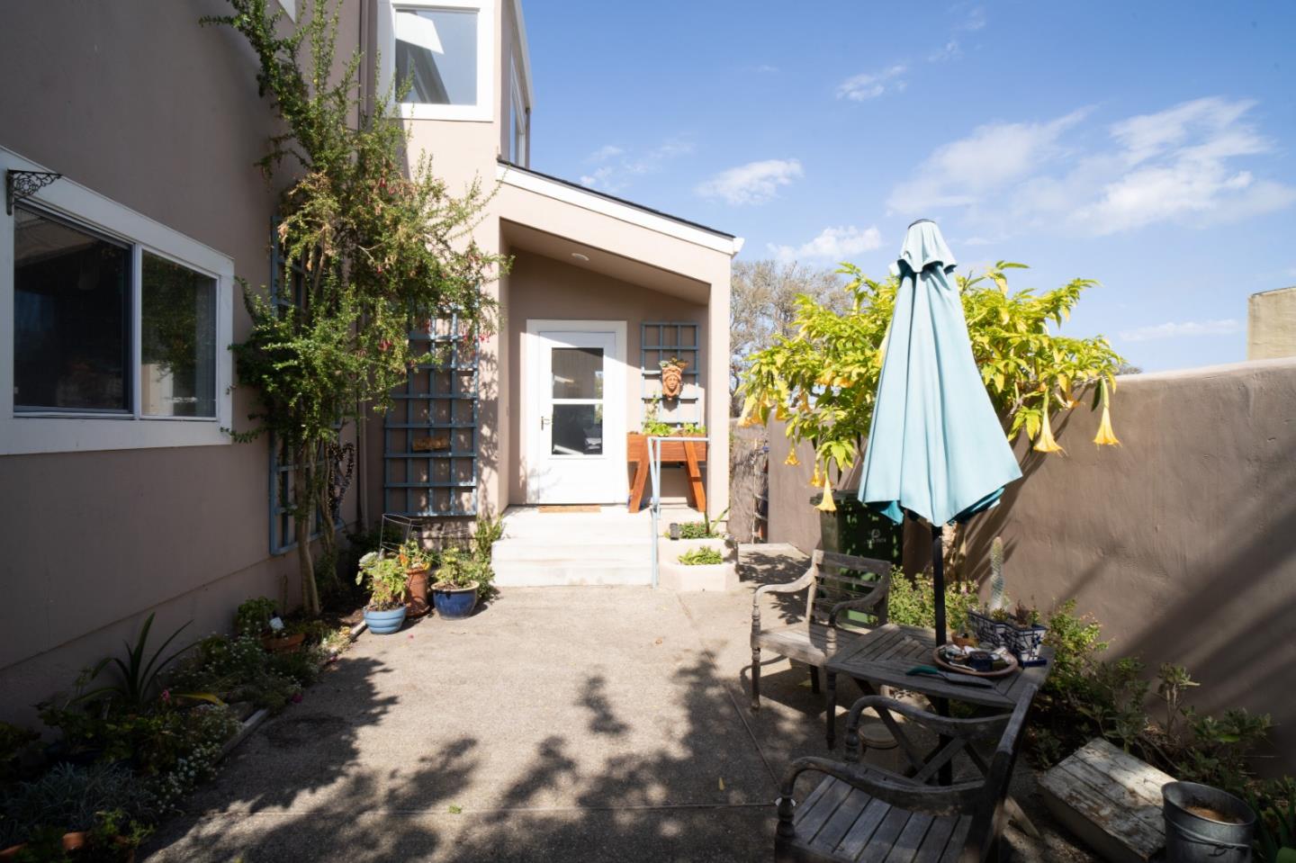 928 Hellam Street Monterey, CA 93940 - Photo 24 of 25 a view of a house with backyard