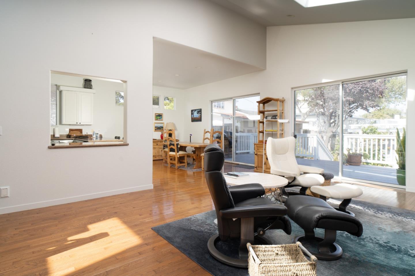 928 Hellam Street Monterey, CA 93940 - Photo 4 of 25 a living room with furniture large window and wooden floor