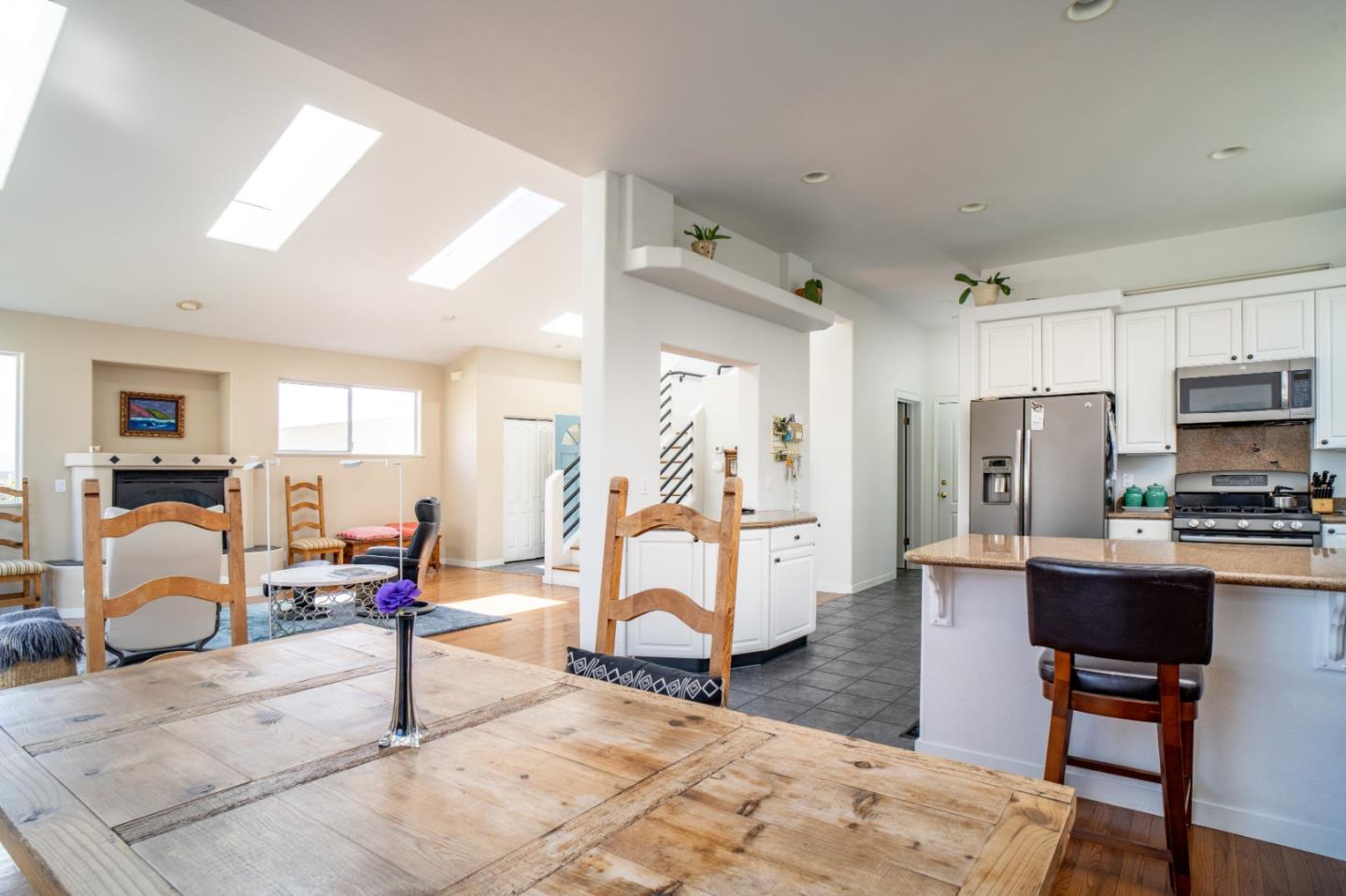 928 Hellam Street Monterey, CA 93940 - Photo 7 of 25 a view of a living room kitchen and a livingroom