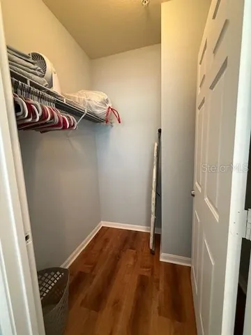 a view of a small space with racks on the wall