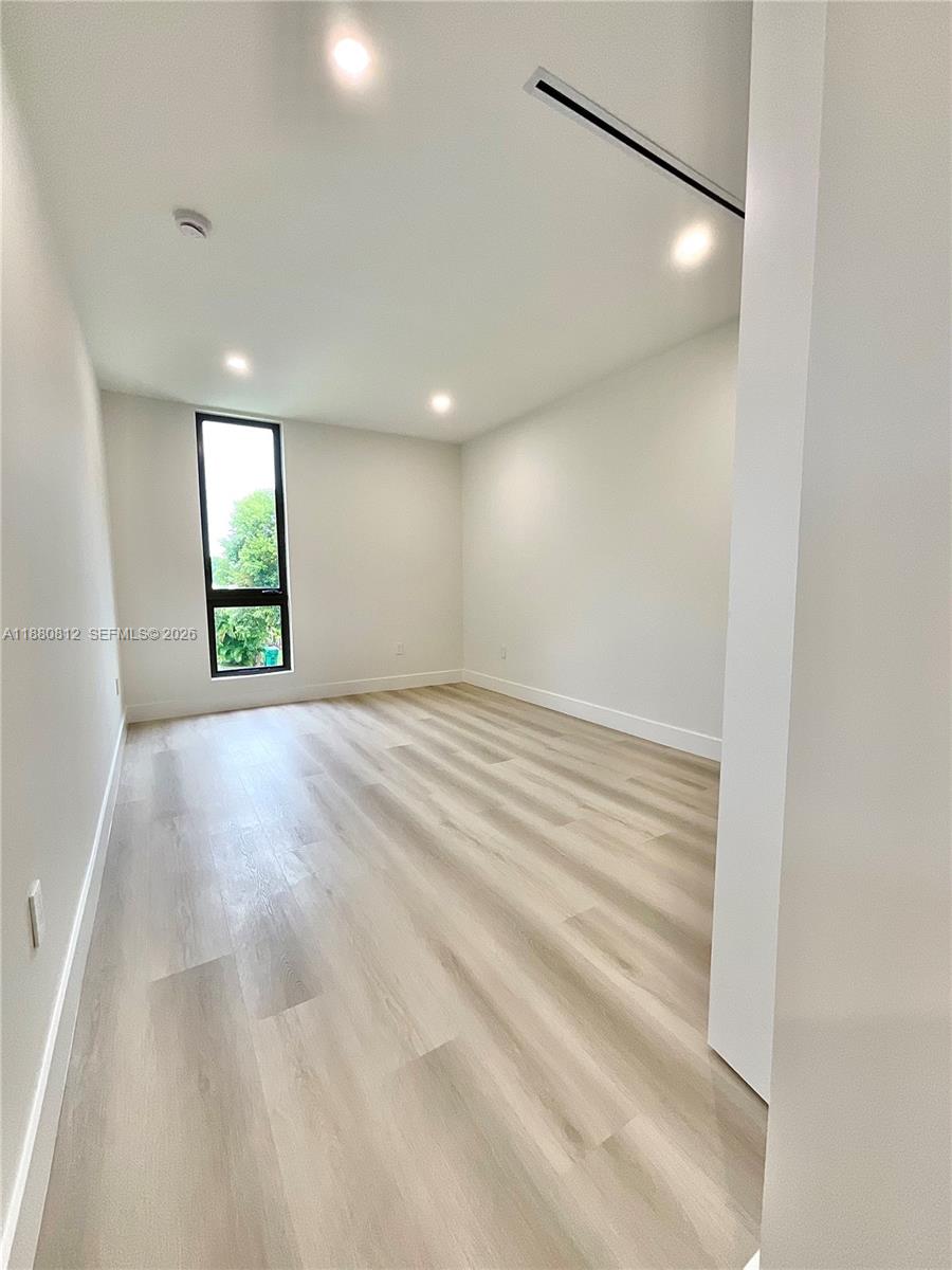 536 Northwest 48th Street Miami, FL 33127 - Photo 23 of 40 a view of an empty room and window