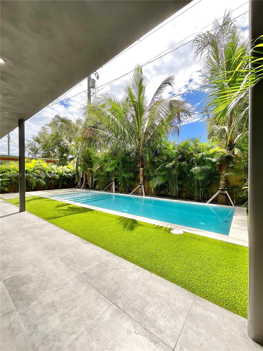 536 Northwest 48th Street Miami, FL 33127 - Photo 26 of 40 a view of swimming pool with a yard