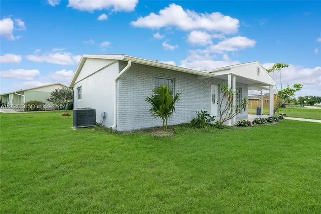 a view of a back yard of the house