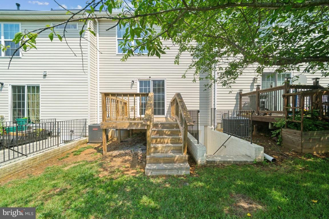 1109 Pomelo Court, Unit 1109 Baltimore, MD 21228 - Photo 40 of 40 a view of a house with a patio