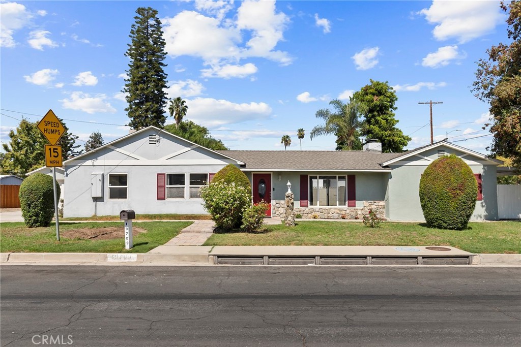 19709 Strathern Street Winnetka, CA 91306 - Photo 1 of 31 a front view of a house with a yard