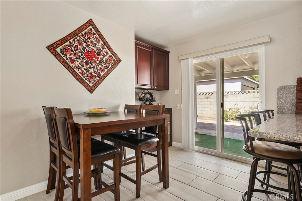 19709 Strathern Street Winnetka, CA 91306 - Photo 12 of 31 a view of a dining room with furniture