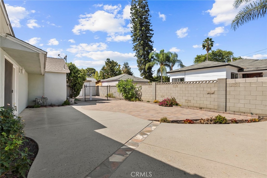 19709 Strathern Street Winnetka, CA 91306 - Photo 29 of 31 a view of a house with a street