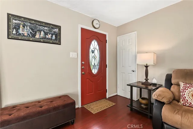 a bedroom with a bed and a lamp on table